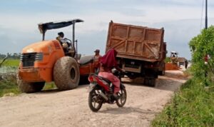 AKHIRNYA RUAS JALAN DESA TELOGO REJO KECAMATAN RAWA JITU UTARA DIPERBAIKI.